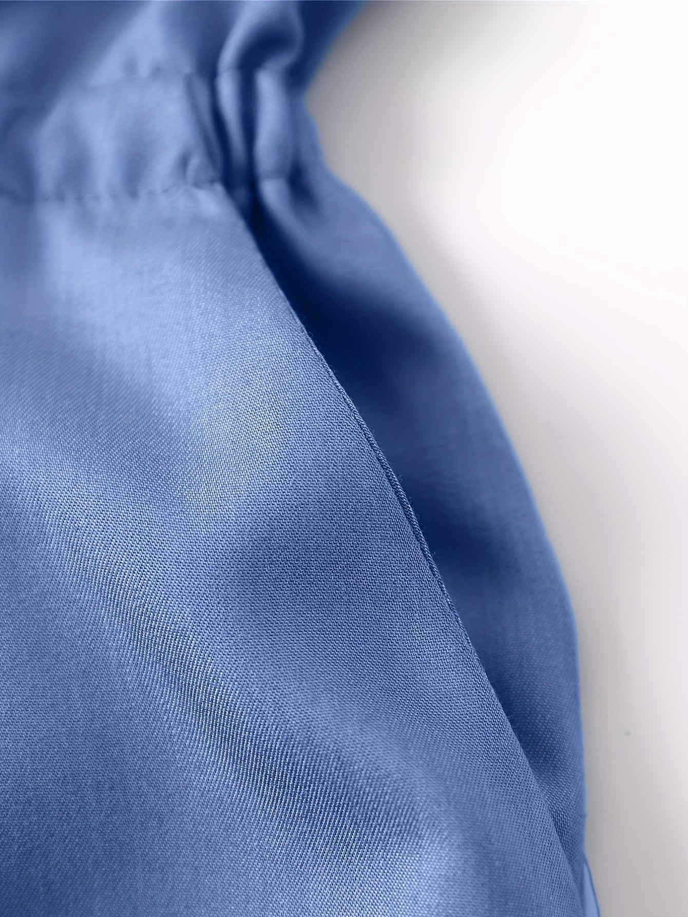 Denim jumpsuit med glidelås foran og belte i midjen