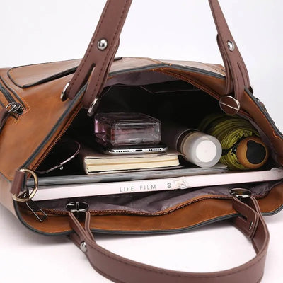 Maelis™ - Skinn Skulderveske" can be rewritten as "Maelis™ - Leather Shoulder Bag.
