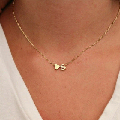 navnesmykke med initialen Ria | 18k Gull