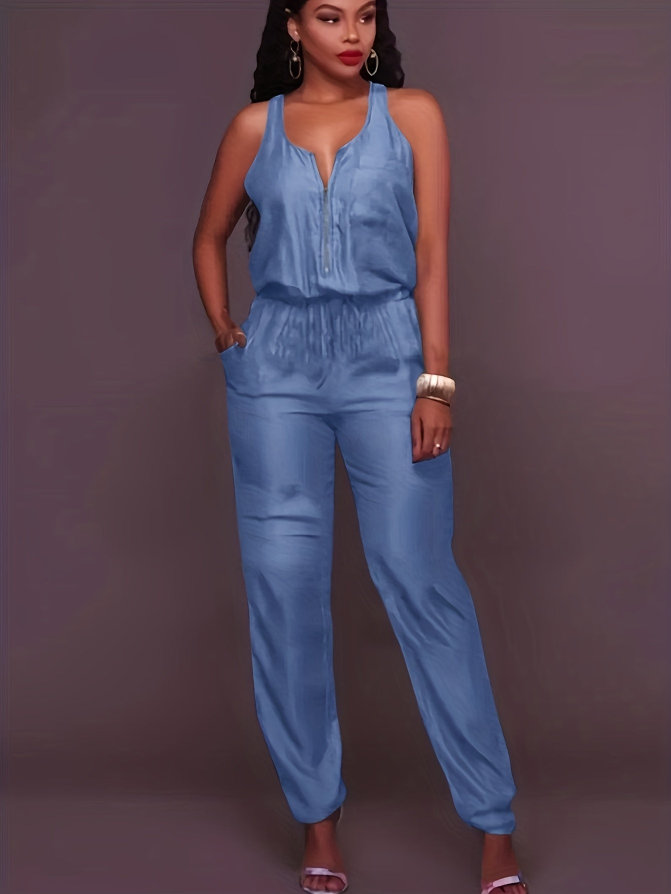 Denim jumpsuit med glidelås foran og belte i midjen
