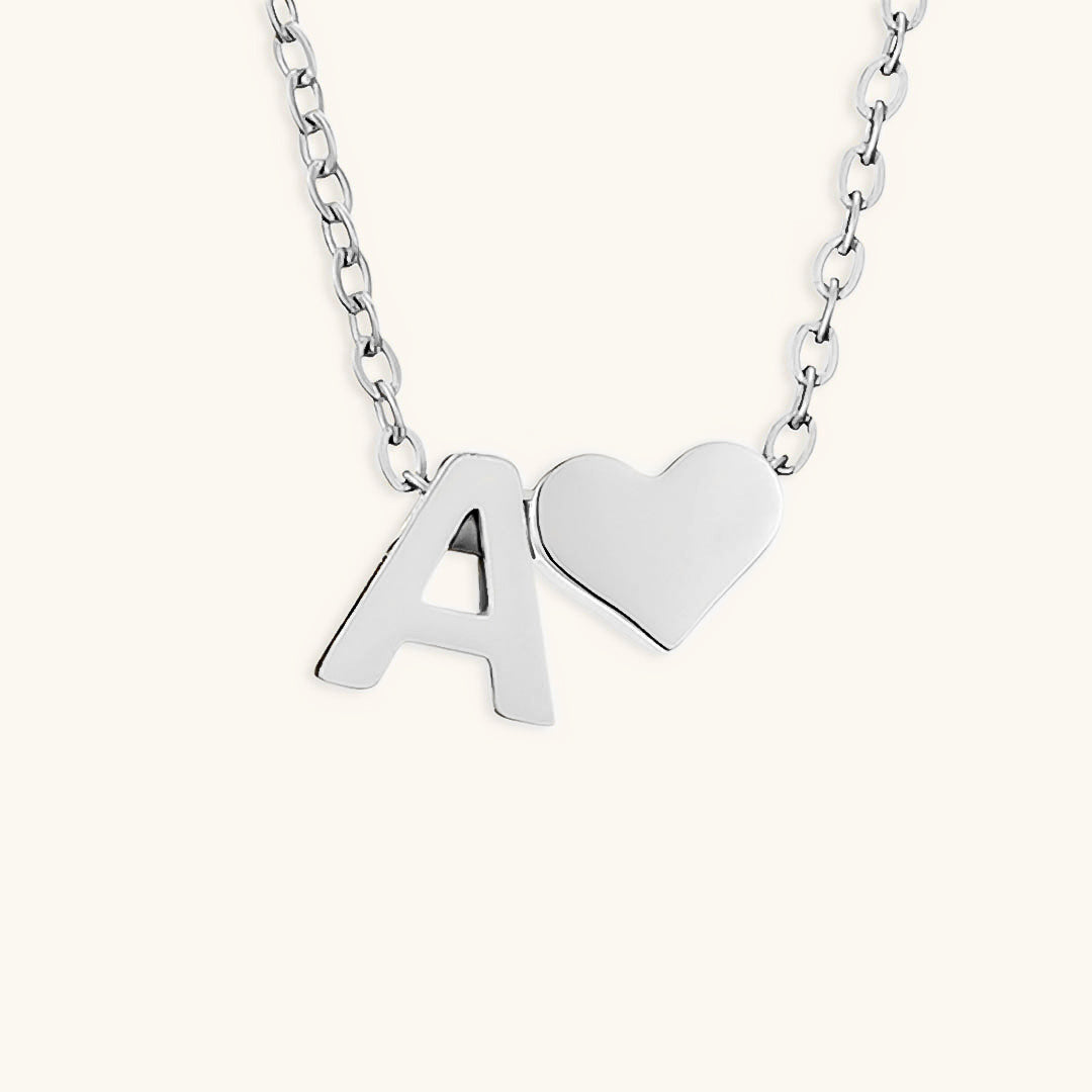 navnesmykke med initialen Ria | 18k Gull