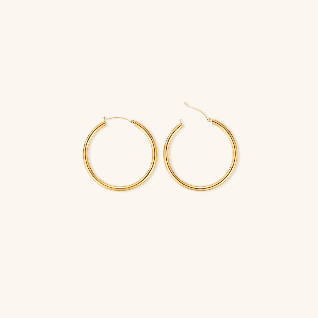 Elegante brede runde øreringer | 18k gull