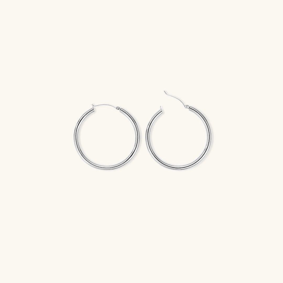 Elegante brede runde øreringer | 18k gull