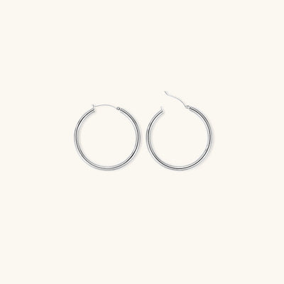 Elegante brede runde øreringer | 18k gull