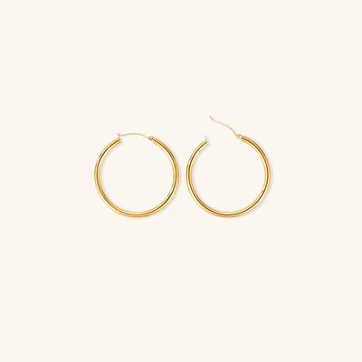 Elegante brede runde øreringer | 18k gull