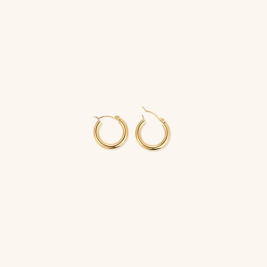 Elegante brede runde øreringer | 18k gull