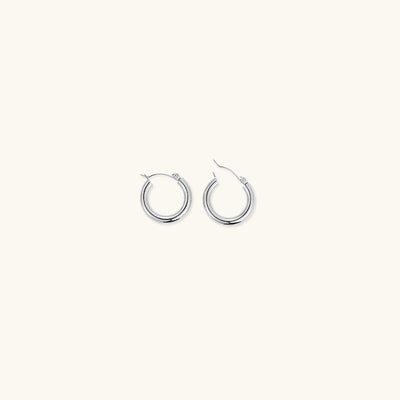 Elegante brede runde øreringer | 18k gull