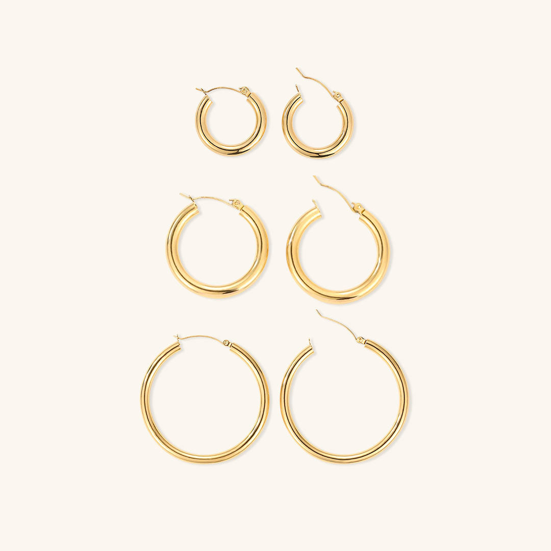 Elegante brede runde øreringer | 18k gull