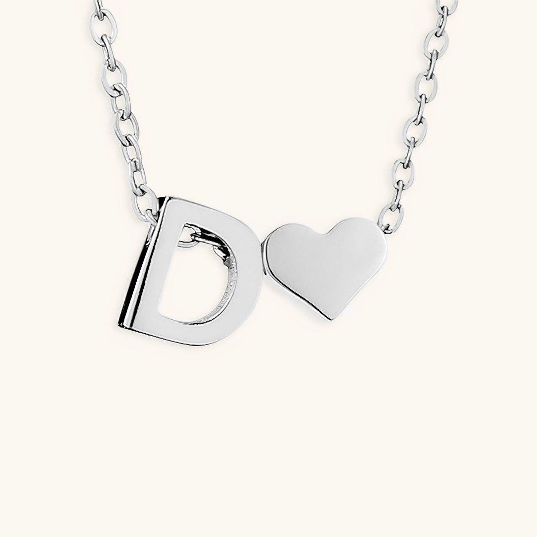 navnesmykke med initialen Ria | 18k Gull