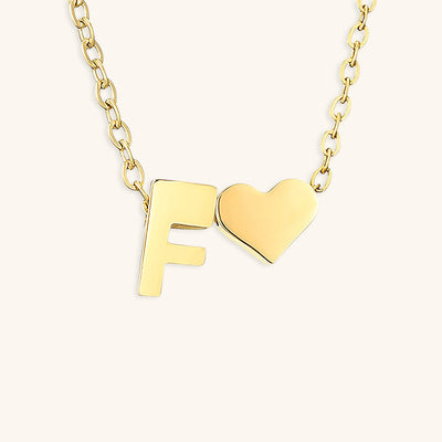navnesmykke med initialen Ria | 18k Gull