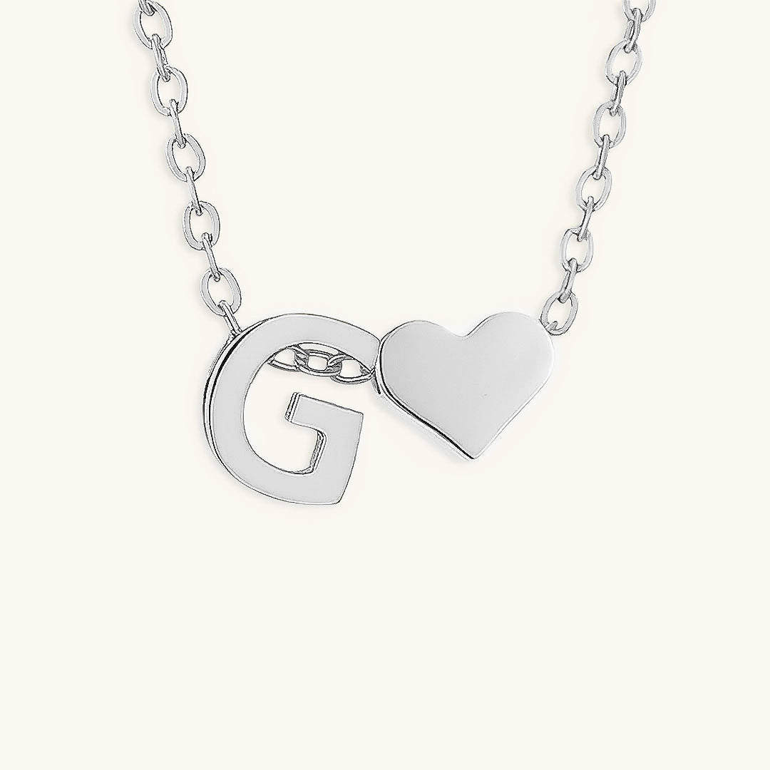 navnesmykke med initialen Ria | 18k Gull