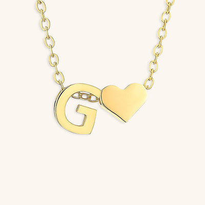 navnesmykke med initialen Ria | 18k Gull