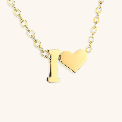 navnesmykke med initialen Ria | 18k Gull