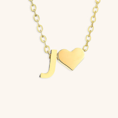 navnesmykke med initialen Ria | 18k Gull