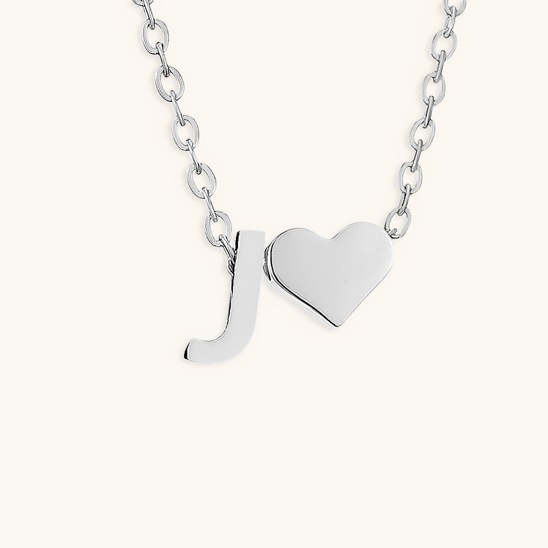 navnesmykke med initialen Ria | 18k Gull