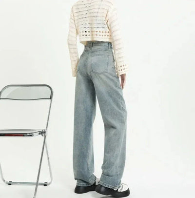 Høyt midjede jeans med slitte lommer