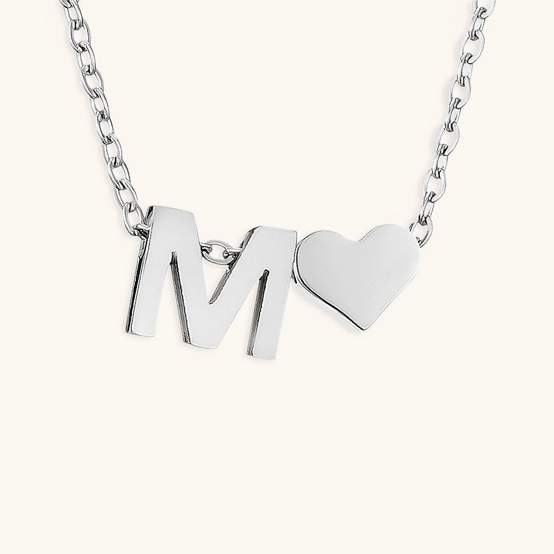navnesmykke med initialen Ria | 18k Gull