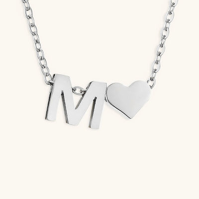 navnesmykke med initialen Ria | 18k Gull