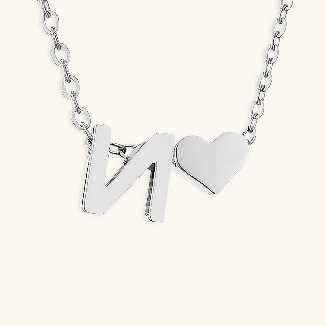 navnesmykke med initialen Ria | 18k Gull