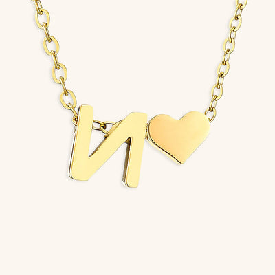 navnesmykke med initialen Ria | 18k Gull
