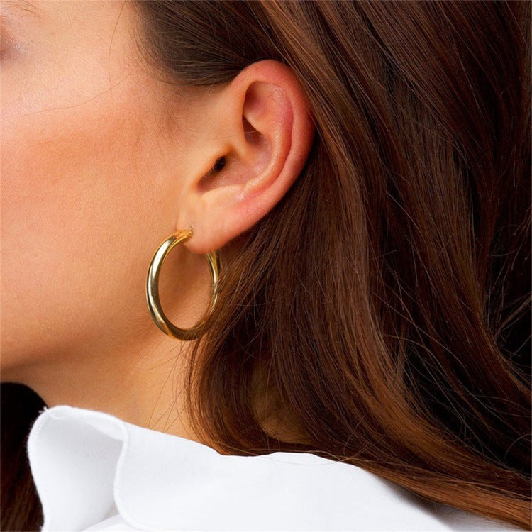 Elegante brede runde øreringer | 18k gull