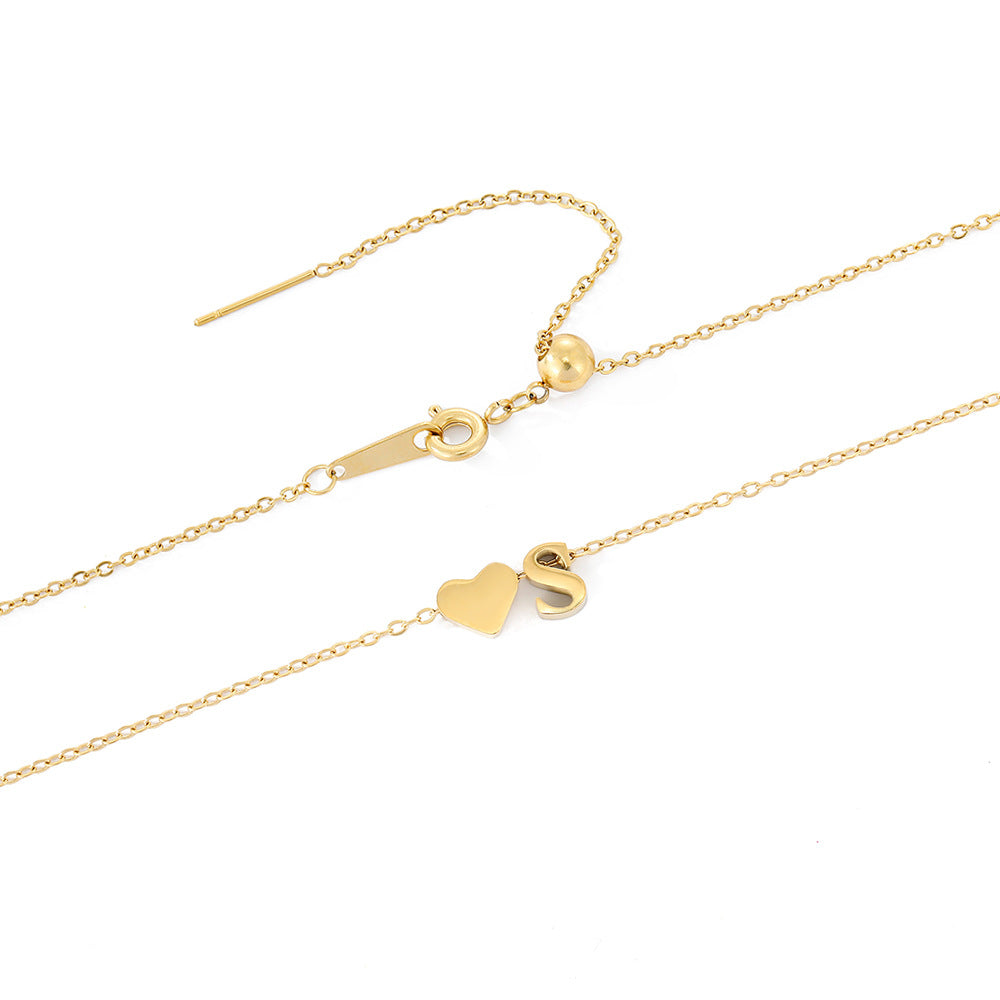 navnesmykke med initialen Ria | 18k Gull