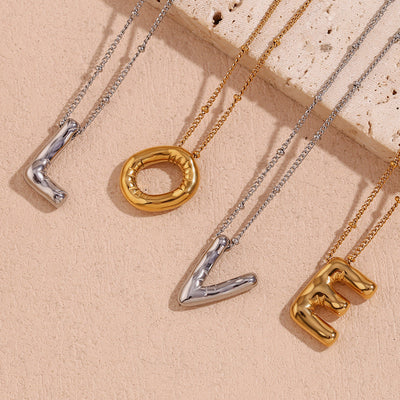 Neseørering med initialer i bobleform | Gull 18k
