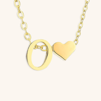 navnesmykke med initialen Ria | 18k Gull
