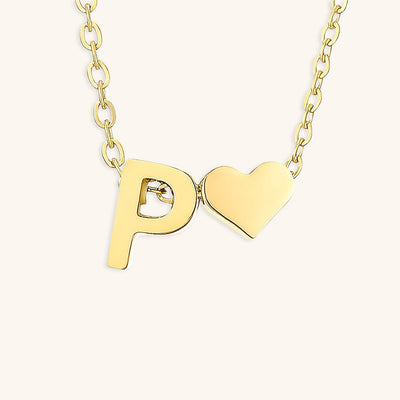 navnesmykke med initialen Ria | 18k Gull