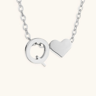 navnesmykke med initialen Ria | 18k Gull