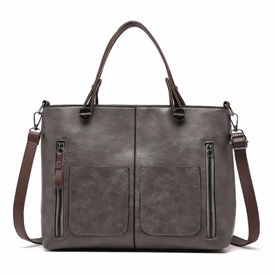"Lina™ - Vintage-inspirert lær skulderveske" can be rewritten as "Lina™ - Retro-inspirert lær skulderveske".