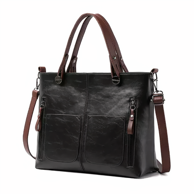 "Lina™ - Vintage-inspirert lær skulderveske" can be rewritten as "Lina™ - Retro-inspirert lær skulderveske".