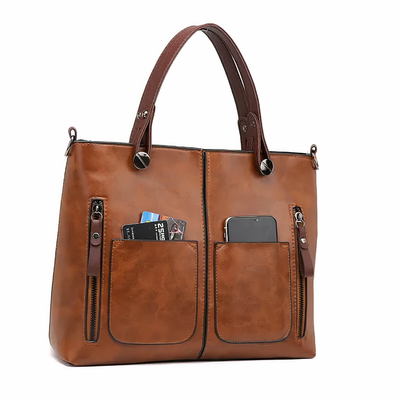 "Lina™ - Vintage-inspirert lær skulderveske" can be rewritten as "Lina™ - Retro-inspirert lær skulderveske".