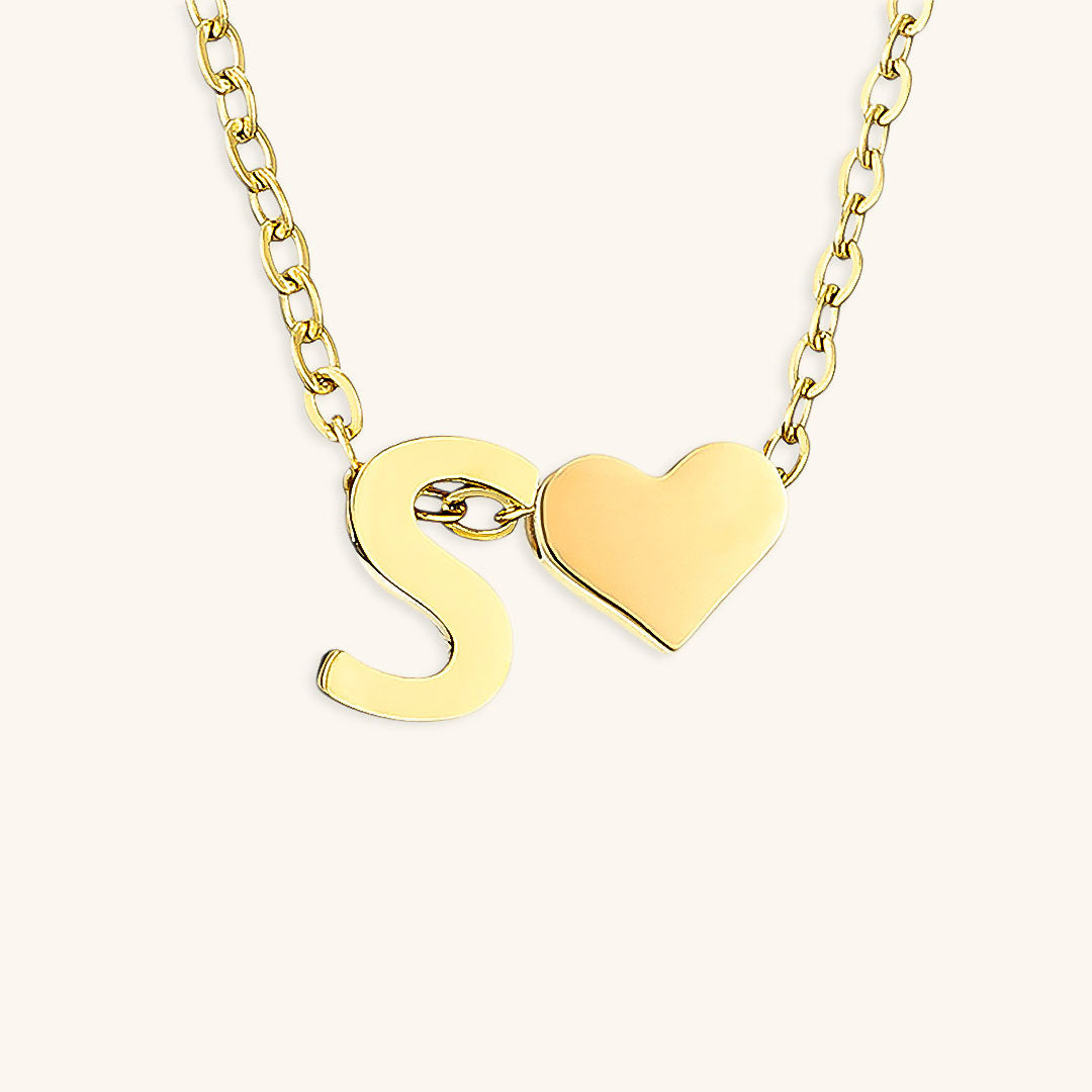 navnesmykke med initialen Ria | 18k Gull