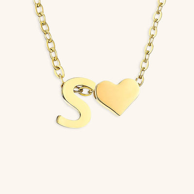 navnesmykke med initialen Ria | 18k Gull