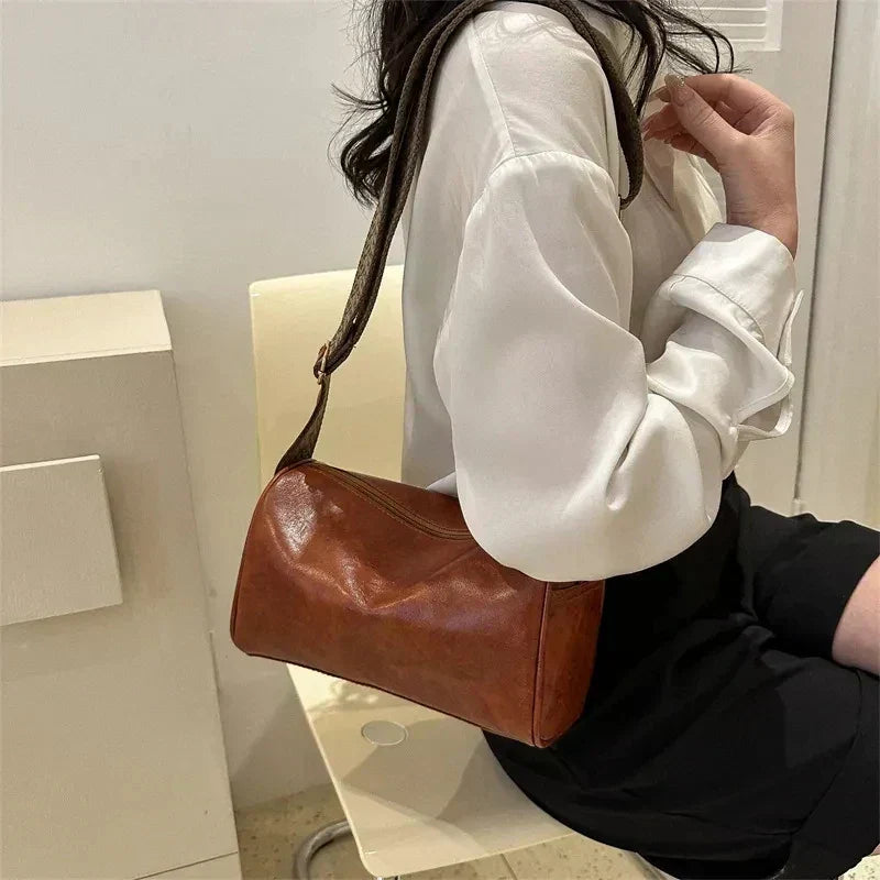 Trine™ | Vintage Skinn Crossbody Veske med Justerbar Vevd Rem