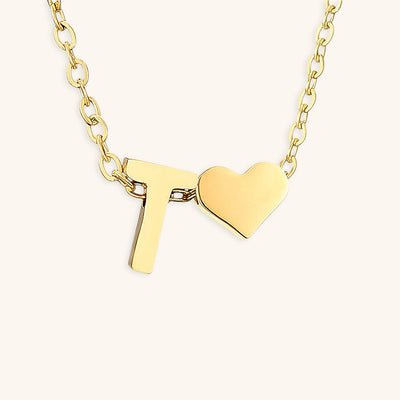 navnesmykke med initialen Ria | 18k Gull