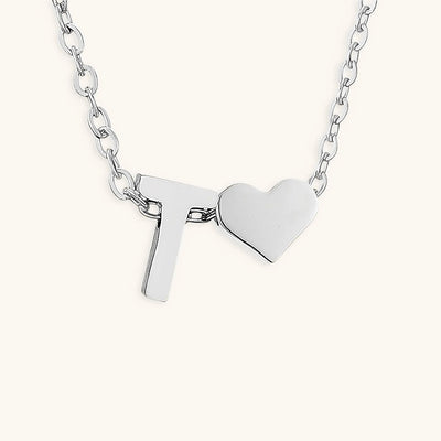 navnesmykke med initialen Ria | 18k Gull