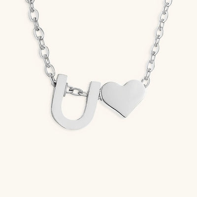navnesmykke med initialen Ria | 18k Gull