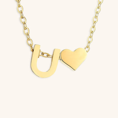 navnesmykke med initialen Ria | 18k Gull
