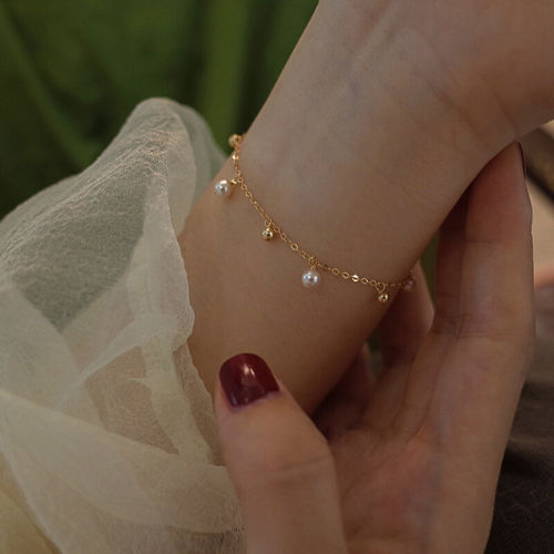 Ferskvannsperle gull armbånd
