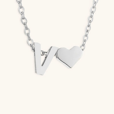 navnesmykke med initialen Ria | 18k Gull
