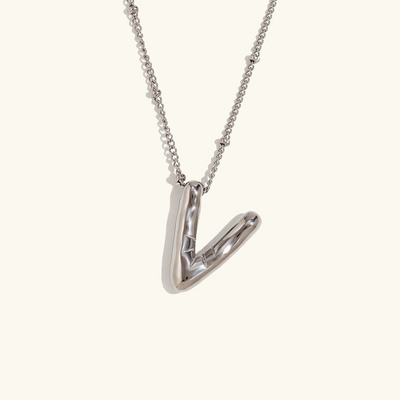 Neseørering med initialer i bobleform | Gull 18k