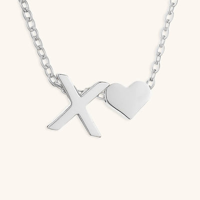 navnesmykke med initialen Ria | 18k Gull