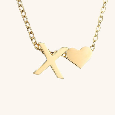 navnesmykke med initialen Ria | 18k Gull