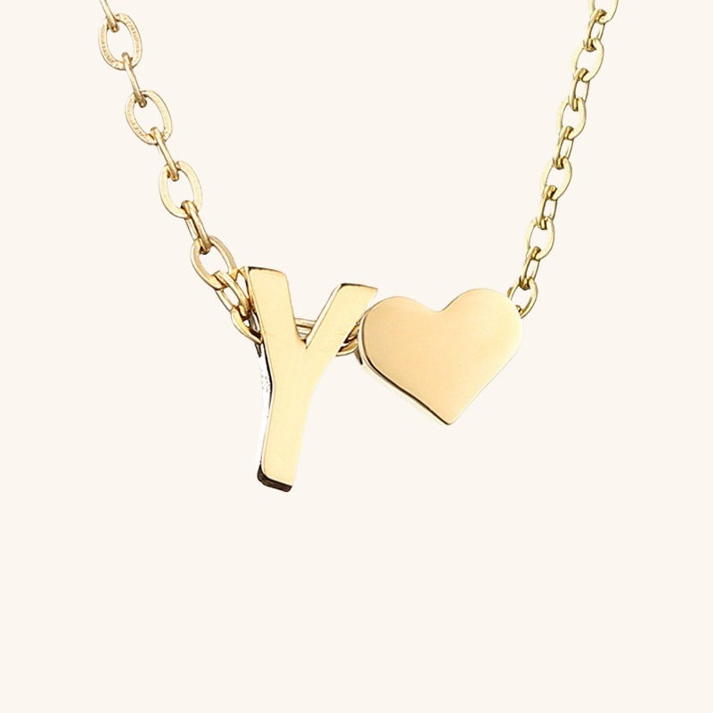 navnesmykke med initialen Ria | 18k Gull