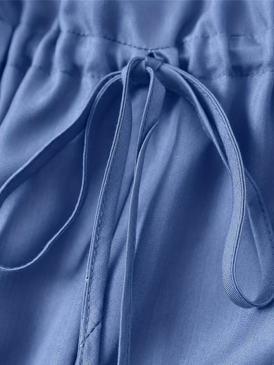 Denim jumpsuit med glidelås foran og belte i midjen