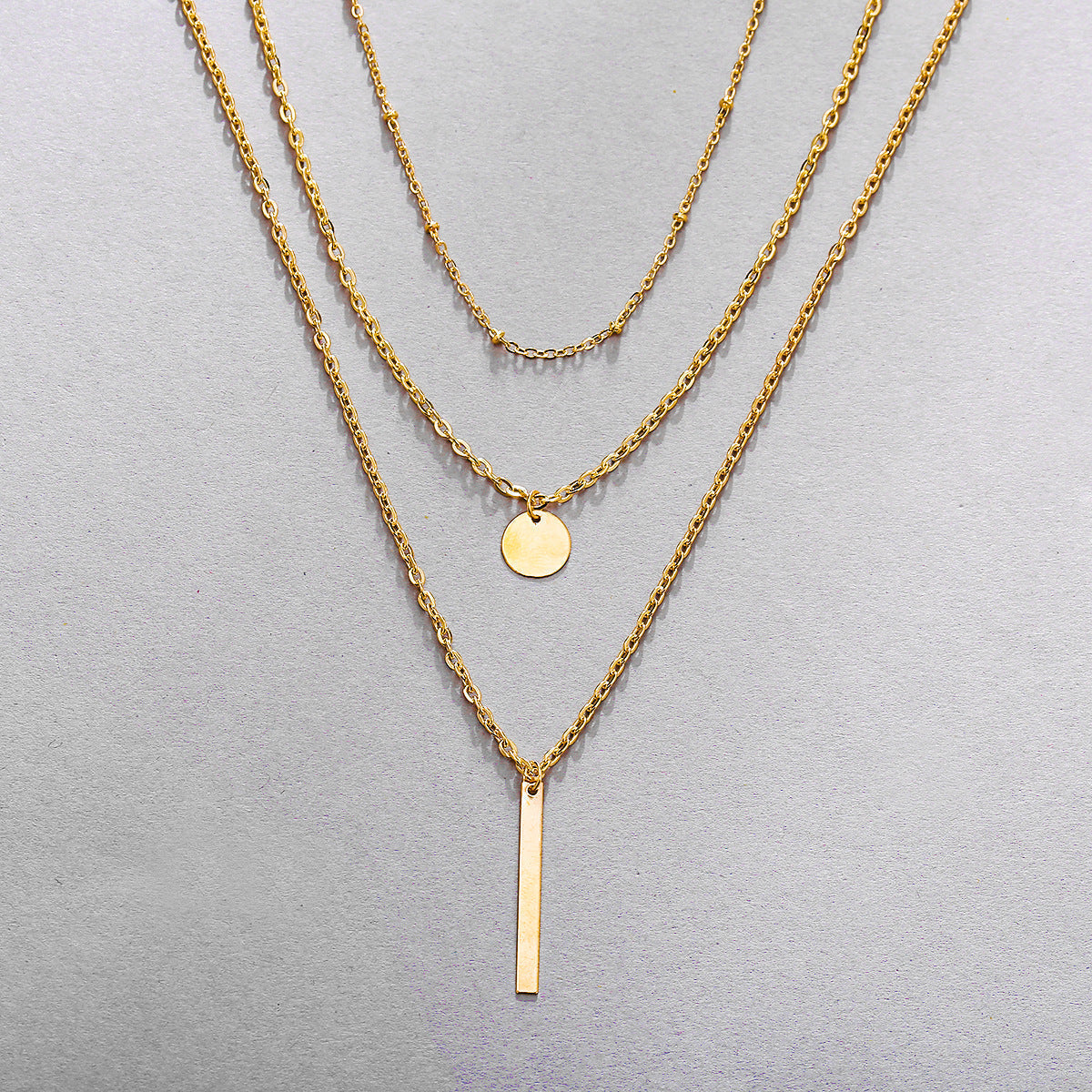 Lagdelte Vintage Geo halskjede med anheng | 18k Gull