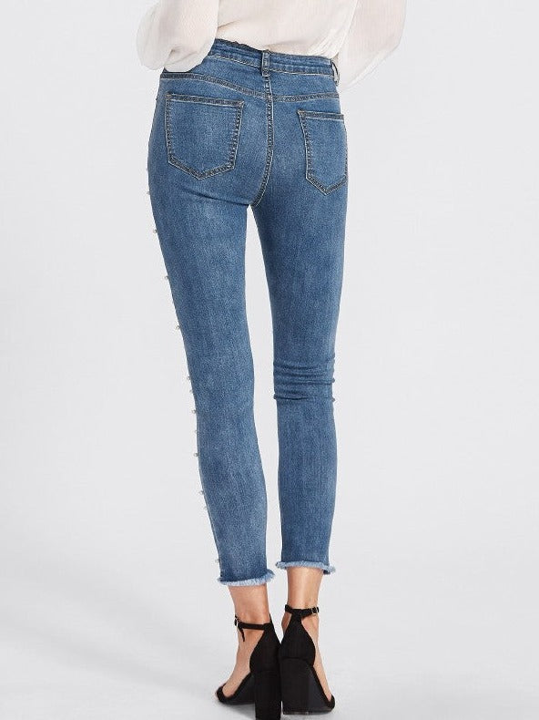 Jeans med hvite perler