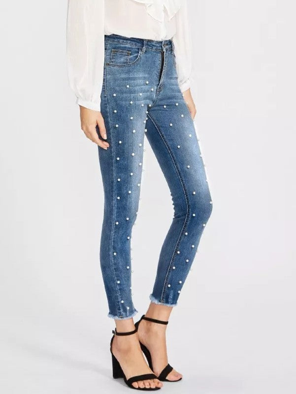 Jeans med hvite perler